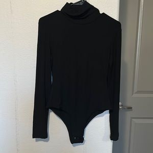 Never worn black turtle neck body suit